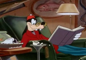 Goofy reading the dictionary. He likes to break a mental sweat, too.